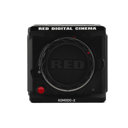 Red Komodo X digital cinema camera contrasts boldly with a black backdrop.