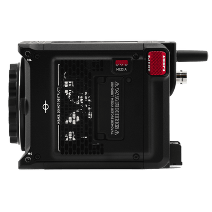  Red Komodo X digital cinema camera contrasts boldly with a black backdrop.