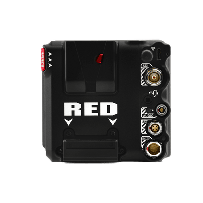  Red Komodo X digital cinema camera contrasts boldly with a black backdrop.
